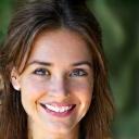 Portrait of Ella, a retreat leader, smiling serenely.